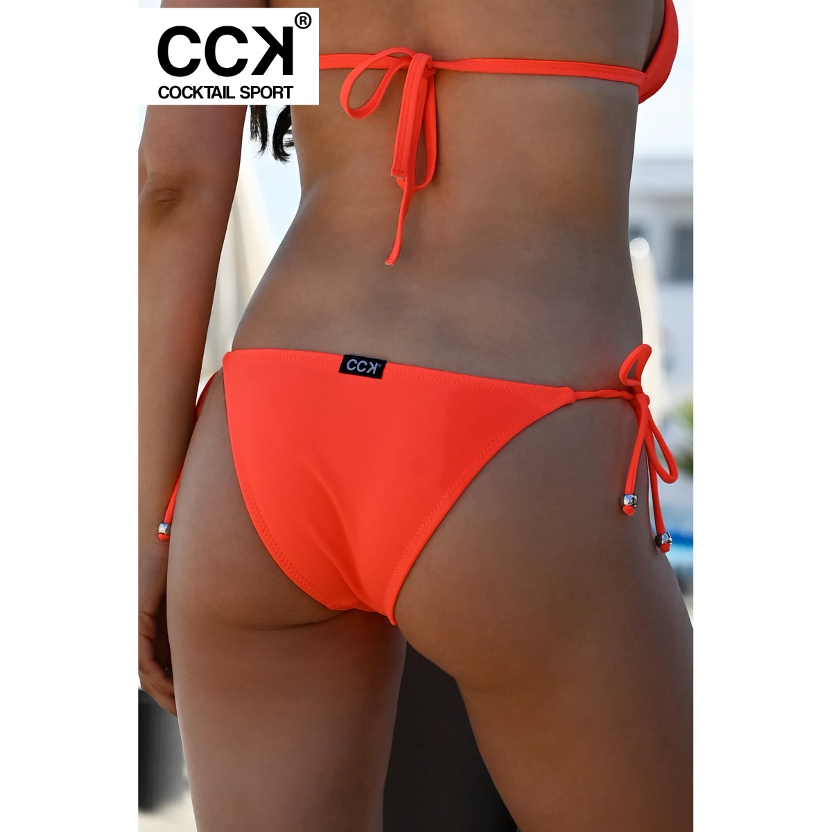 Neon korall (rio) basic, hagyományos fazonú, vékonypántos megkötős bikini alsó
